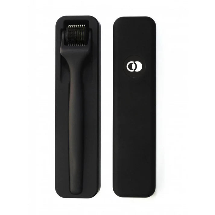 ZENLUCA Hair Growth Dermaroller resting in its open case next to the closed travel case